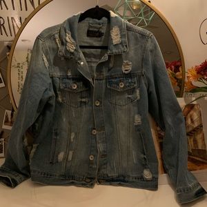 Ripped jean jacket, perfect for layering!